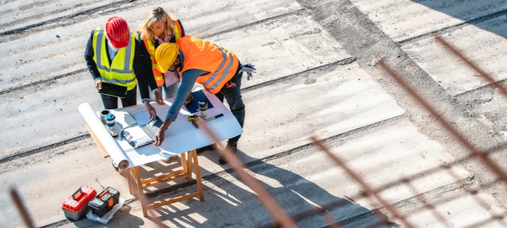 stakeholders reviewing construction company marketing