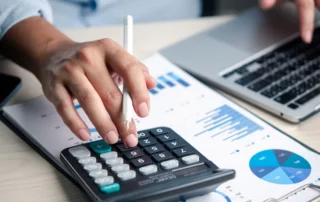 An industrial marketing manager reviewing data to help create marketing budgets for manufacturing companies