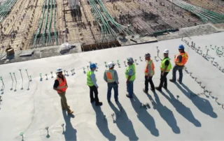 Managers overseeing marketing to construction industry project